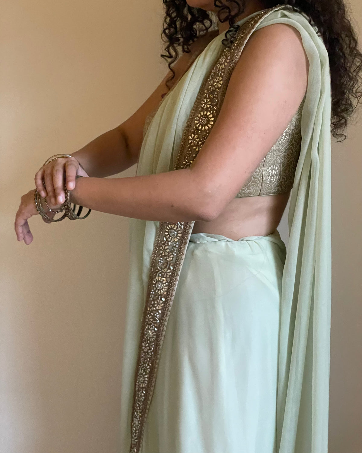 Sage Green Chiffon Saree with Antique-Gold Floral Border