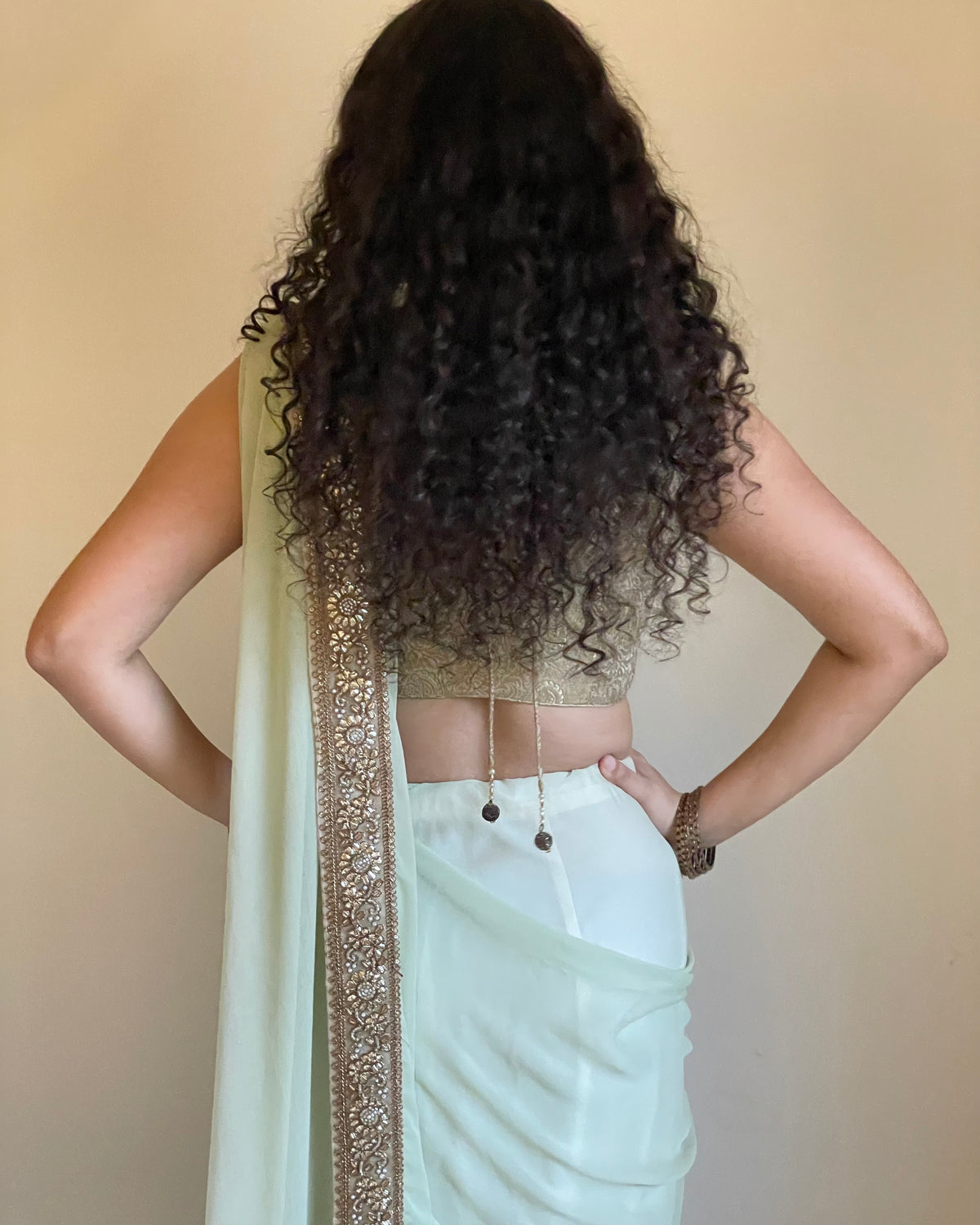 Sage Green Chiffon Saree with Antique-Gold Floral Border