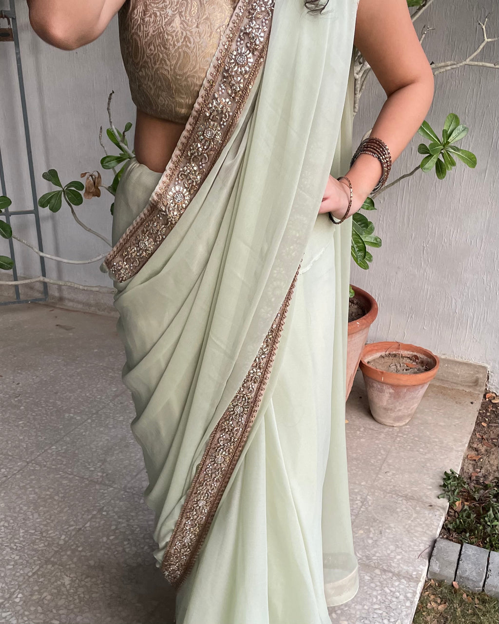 Sage Green Chiffon Saree with Antique-Gold Floral Border