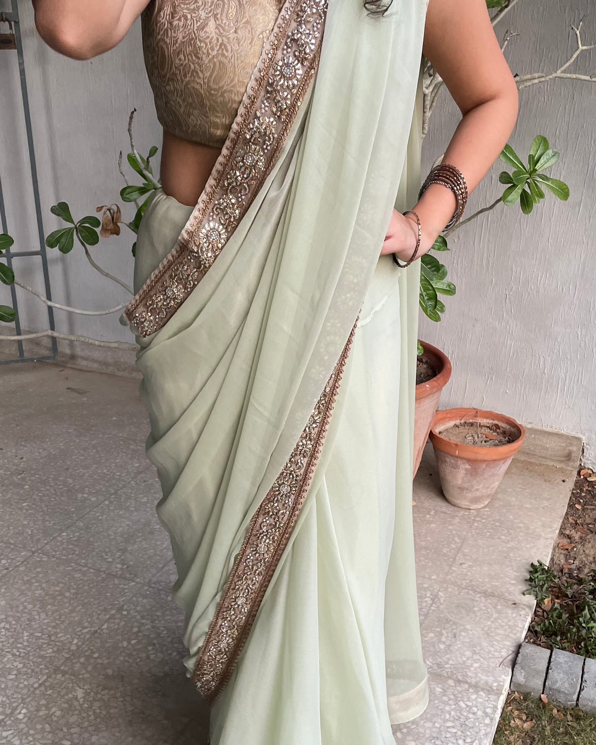 Sage Green Chiffon Saree with Antique-Gold Floral Border
